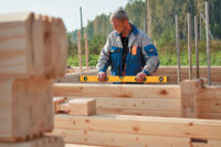 Как подобрать качественный брус для строительства дома из дерева